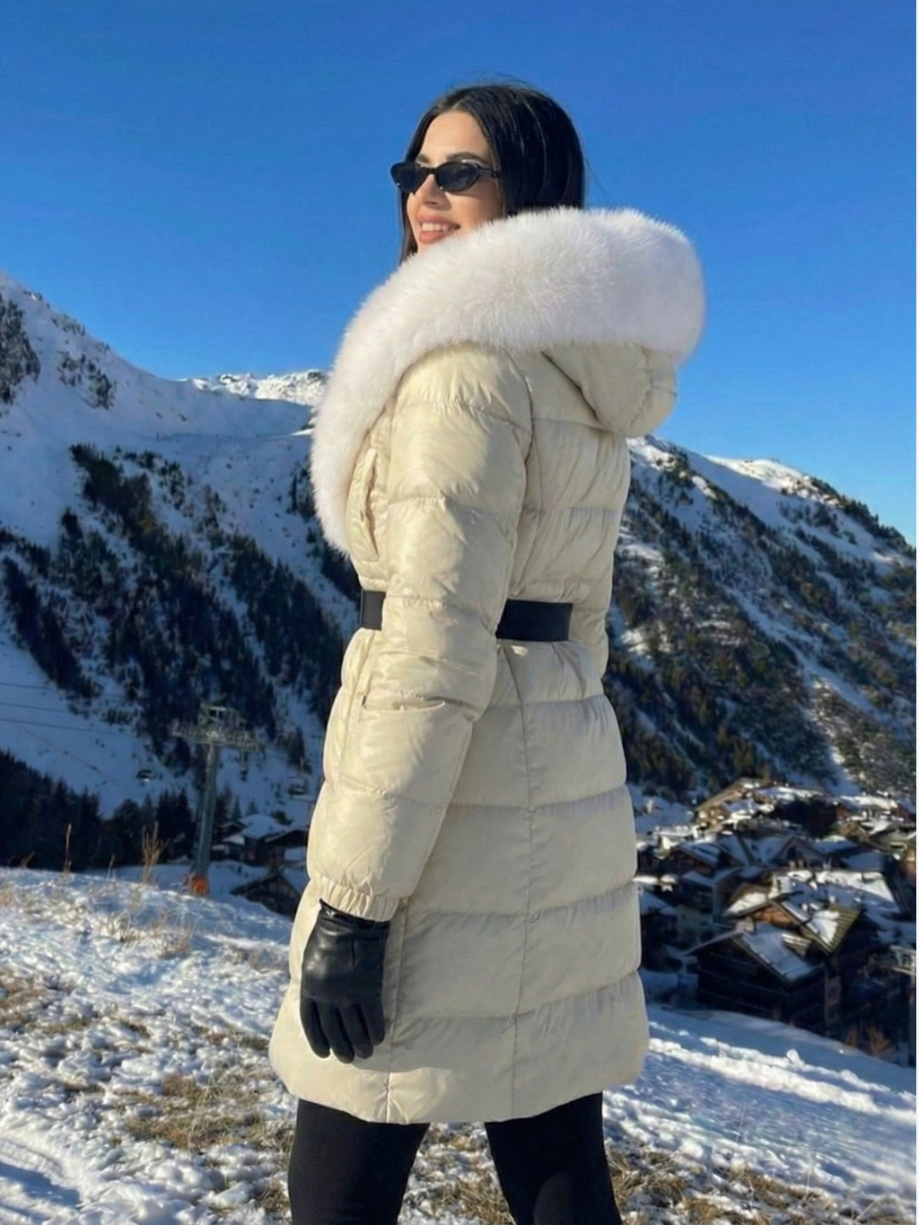 Jane | Long belted puffer jacket with faux fur hood