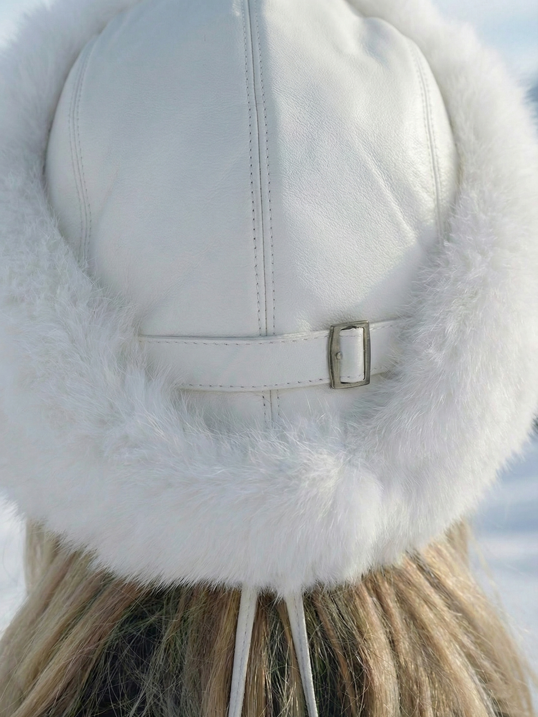 Sia | Bonnet d'hiver en fausse fourrure blanche